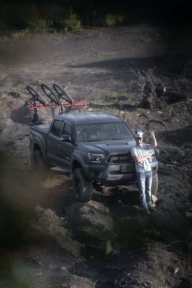 Lifted Tacoma, camping, mountain bikes