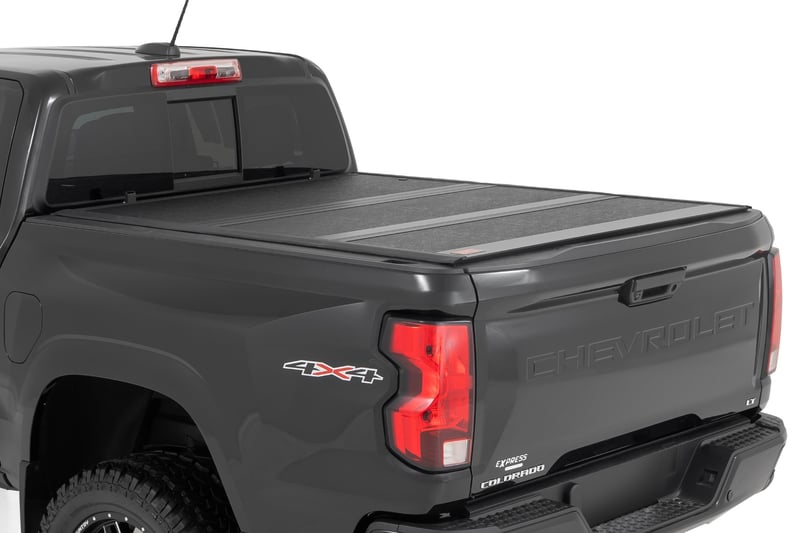Jmotorparts 3-Fold Hard Tonneau Cover For 2015-2025 Chevy Colorado / GMC Canyon – 5ft Bed, Matte Black